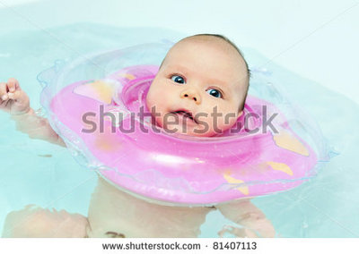 stock-photo-swimming-two-months-old-baby-with-neck-swim-ring-81407113.jpg